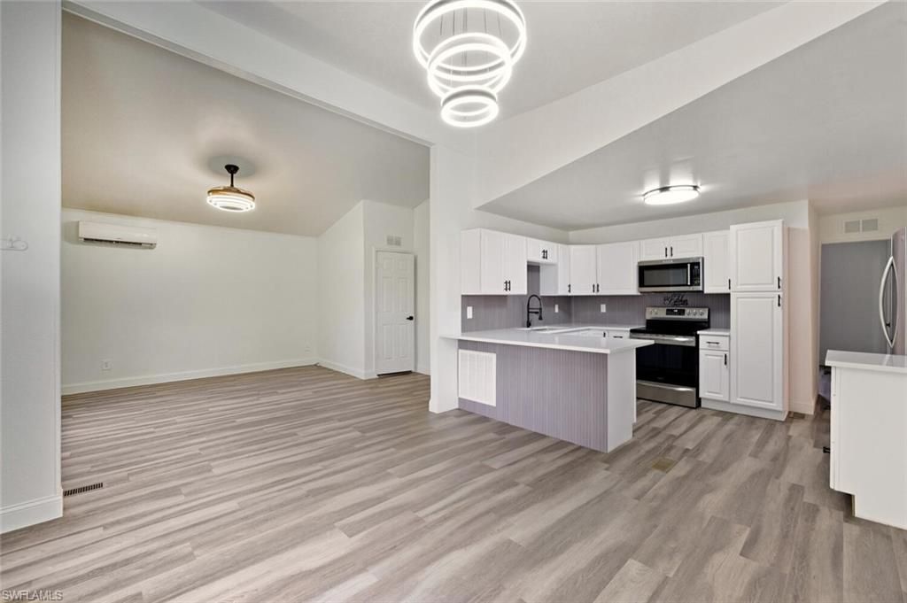 Interior, Kitchen, Pendant Lights, Stainless Steel Appliances, Wood Texture Flooring