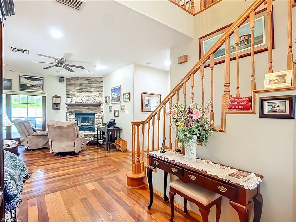 Fireplace, Interior, Recessed Lighting, Stone Walls, Wood Texture Flooring