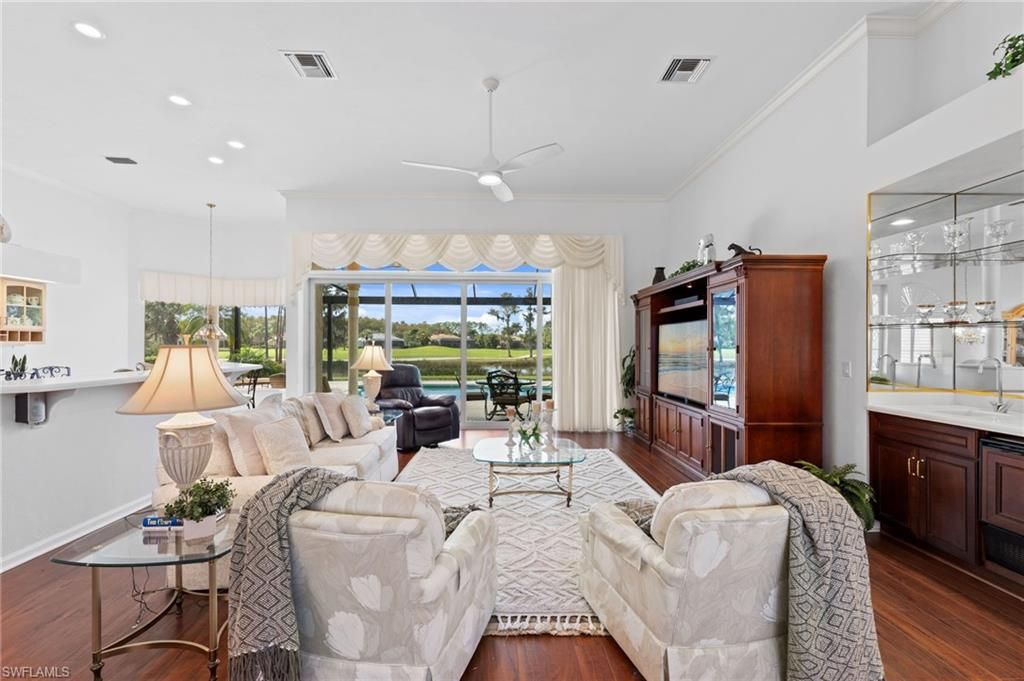 Dining room, Interior, Kitchen, Living room, Pendant Lights, Recessed Lighting, Stainless Steel Appliances, Wood Texture Flooring