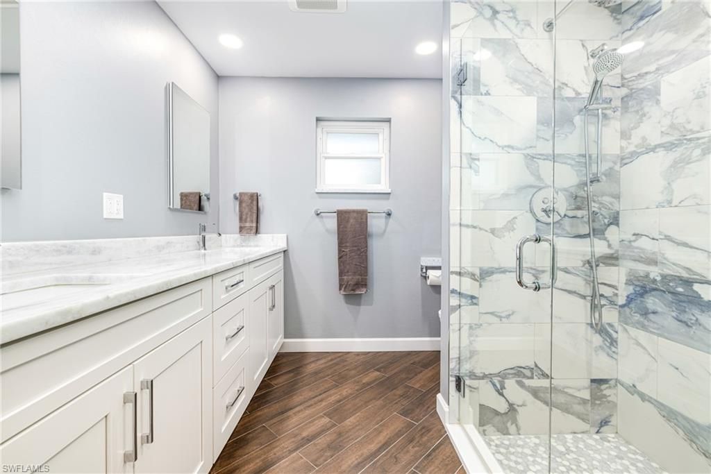 Bathroom, Glass Shower, Interior, Marble Walls, Recessed Lighting, Wood Texture Flooring