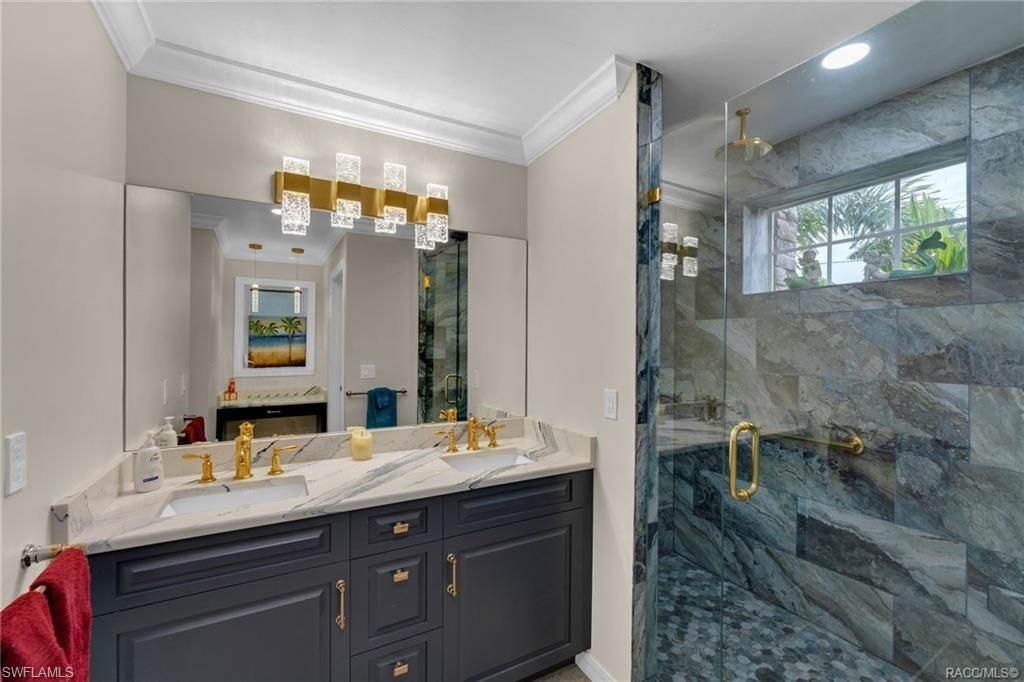 Bathroom, Dual Sink Vanities, Glass Shower, Interior, Marble Walls, Recessed Lighting