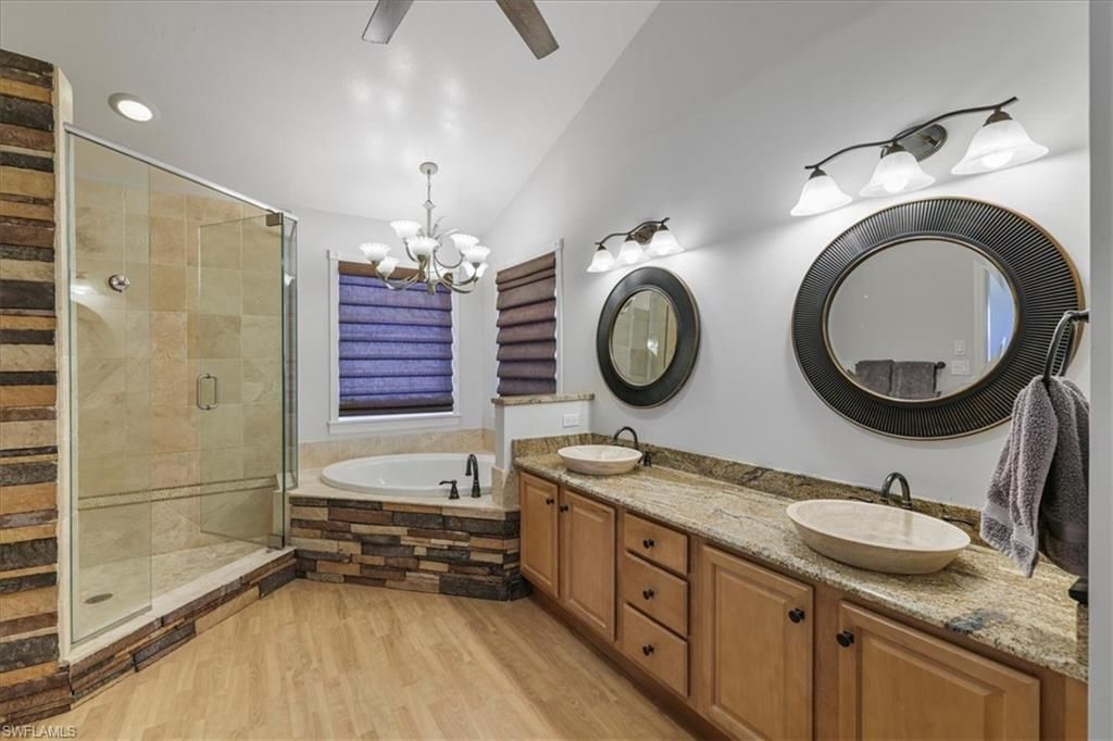 Bathroom, Chandelier, Dual Sink Vanities, Glass Shower, Interior, Recessed Lighting, Wood Texture Flooring