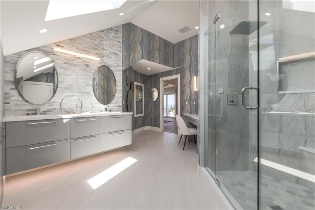 Bathroom, Dual Sink Vanities, Glass Shower, Interior, Marble Walls, Recessed Lighting