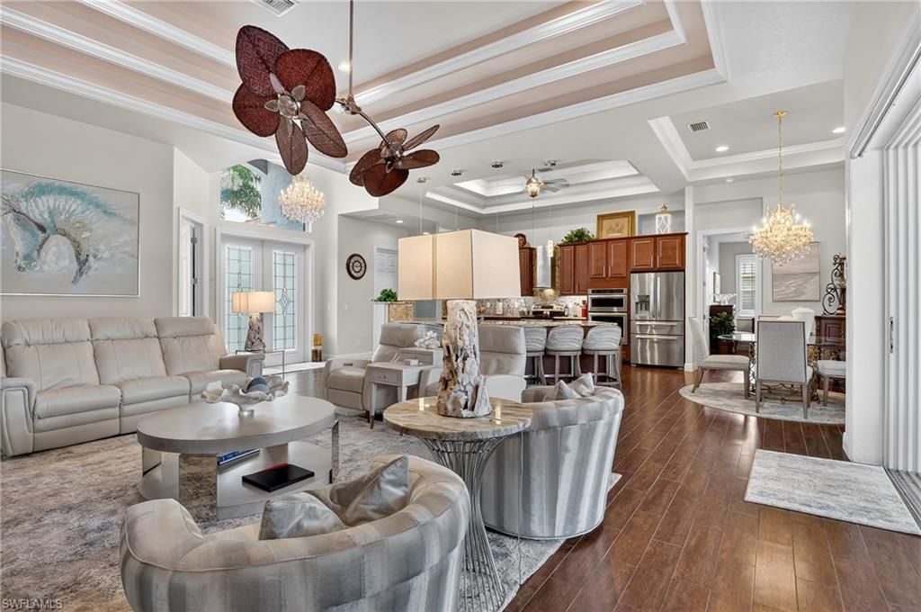 Chandelier, Dining room, Interior, Kitchen, Living room, Recessed Lighting, Stainless Steel Appliances, Wood Texture Flooring