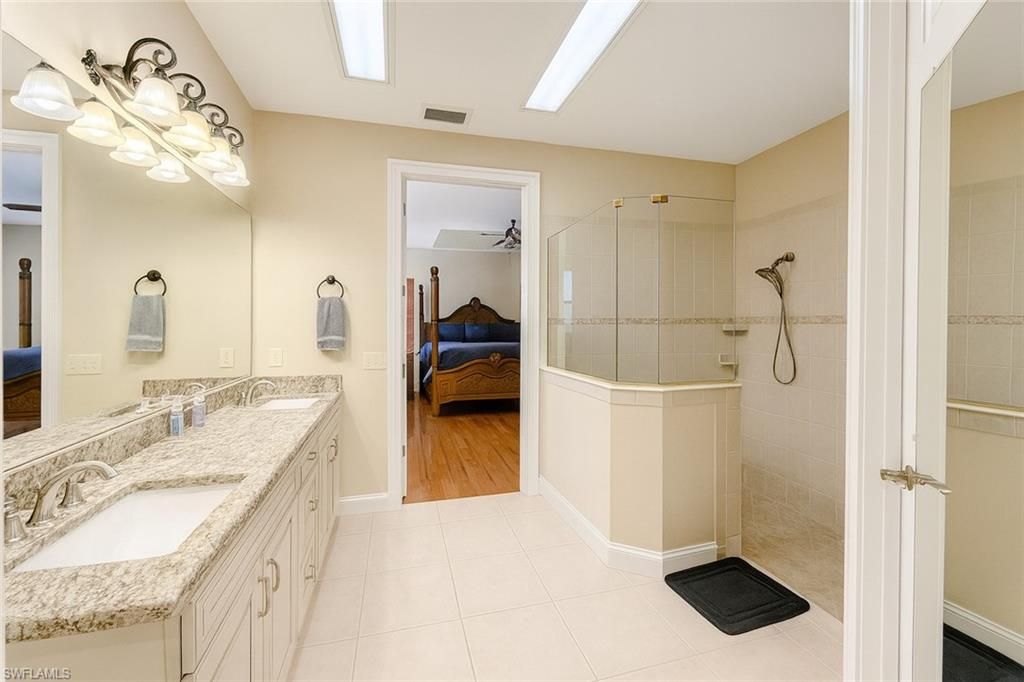 Bathroom, Dual Sink Vanities, Glass Shower, Interior, Wood Texture Flooring