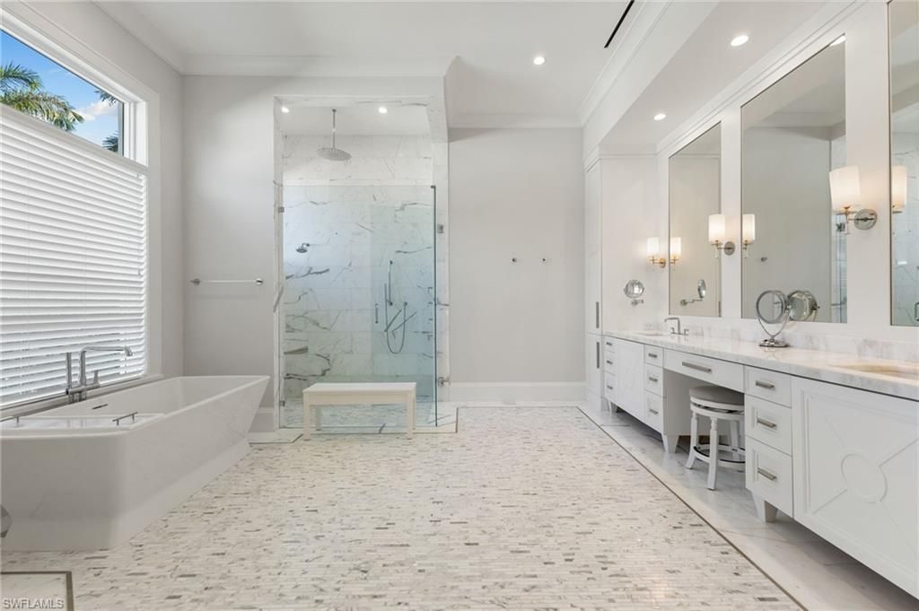 Bathroom, Dual Sink Vanities, Free Standing Baths, Glass Shower, Interior, Marble Walls, Recessed Lighting