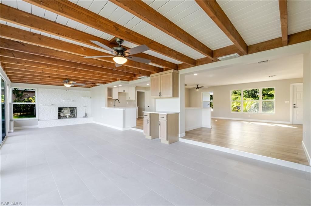 Empty room, Fireplace, Interior, Recessed Lighting, Wooden Beams, Wooden Ceilings, Wood Texture Flooring