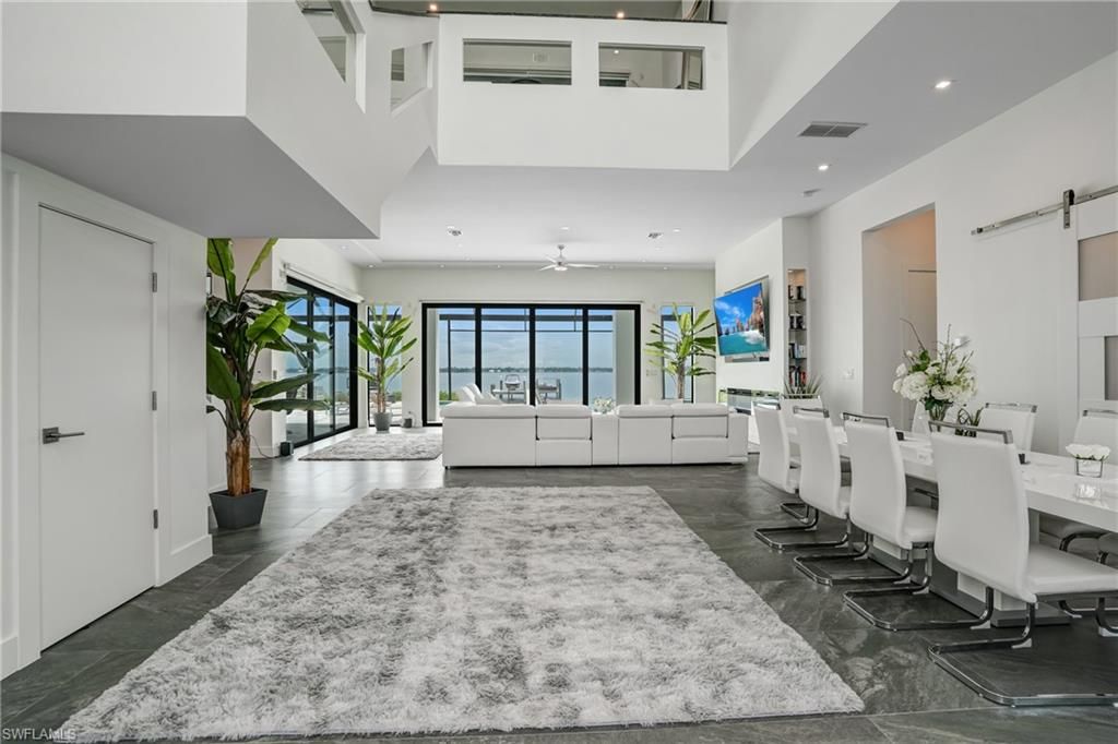 Dining room, Interior, Living room, Recessed Lighting, Water, Wood Texture Flooring