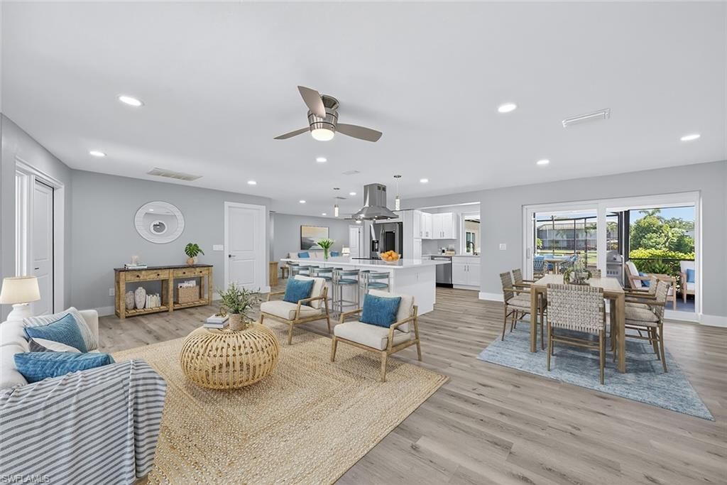 Dining room, Interior, Kitchen, Living room, Pendant Lights, Recessed Lighting, Stainless Steel Appliances, Wood Texture Flooring