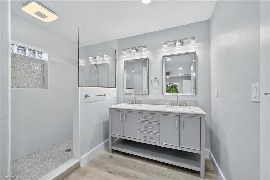 Bathroom, Dual Sink Vanities, Interior, Recessed Lighting, Wood Texture Flooring