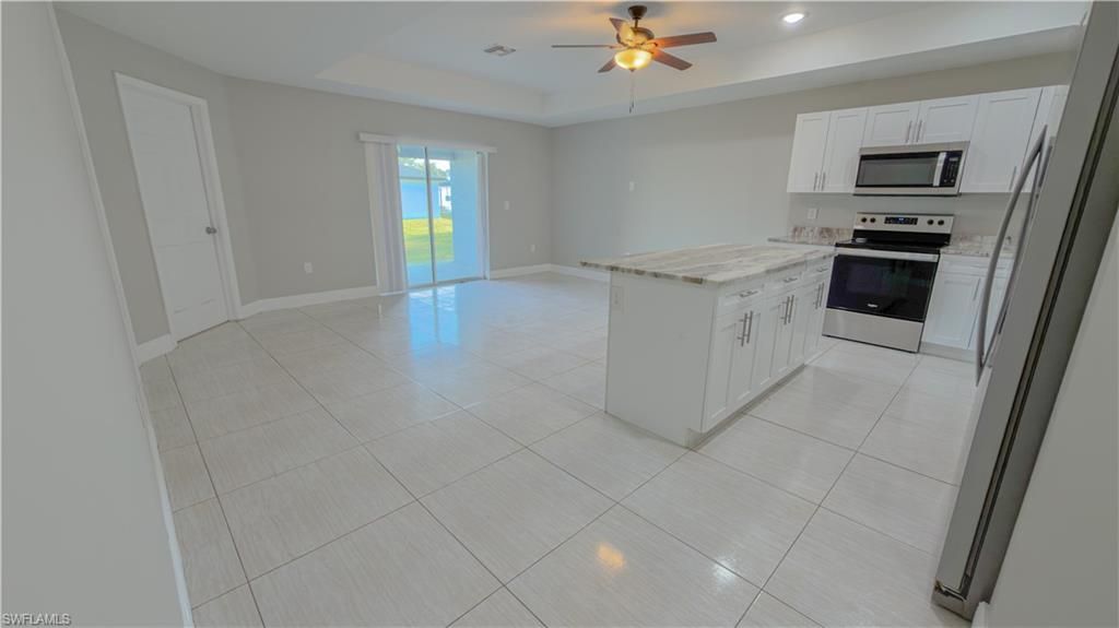 Empty room, Interior, Kitchen, Recessed Lighting, Stainless Steel Appliances