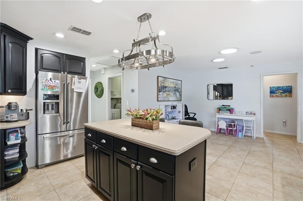 Chandelier, Dining room, Interior, Kitchen, Pendant Lights, Recessed Lighting, Stainless Steel Appliances
