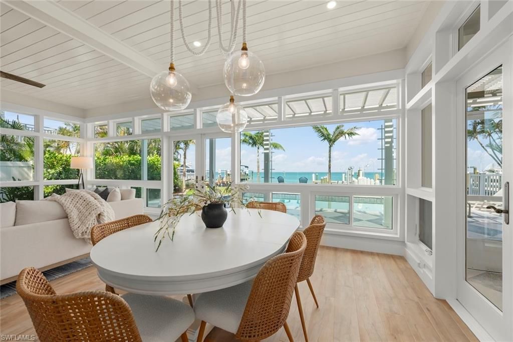 Dining room, Interior, Pendant Lights, Recessed Lighting, Sun Room, Water, Wood Texture Flooring