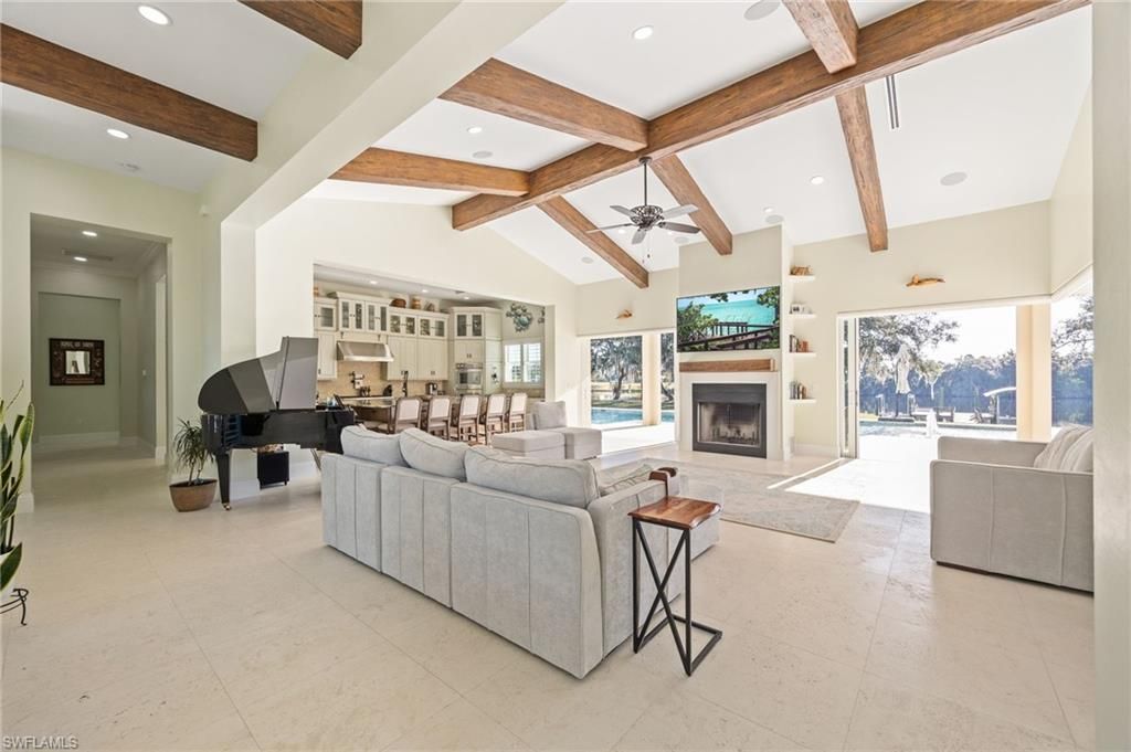 Fireplace, Interior, Living room, Piano, Recessed Lighting, Wooden Beams