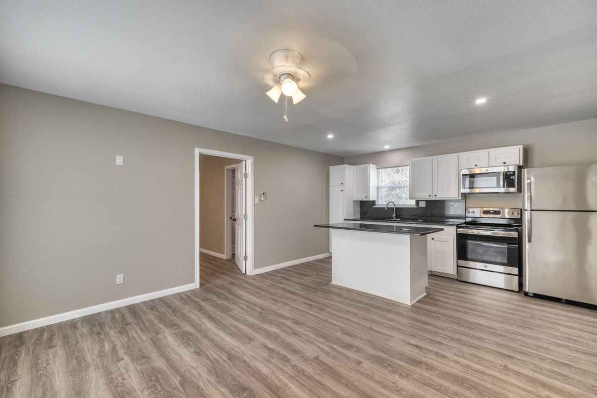 Interior, Kitchen, Recessed Lighting, Stainless Steel Appliances, Wood Texture Flooring