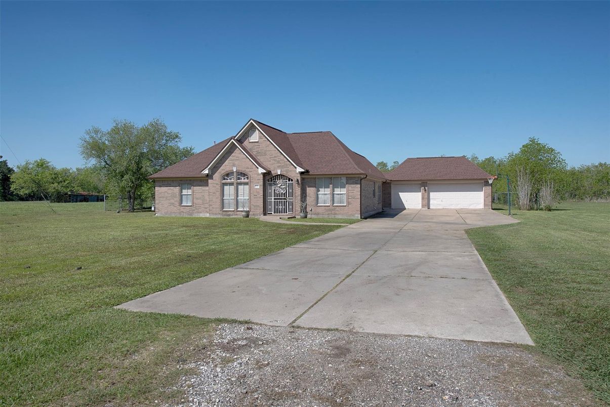 Attached, Backyard, Exterior, Facade, Brick Facade, French Provincial