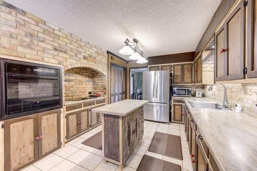 Interior, Kitchen, Stainless Steel Appliances, Stone Walls