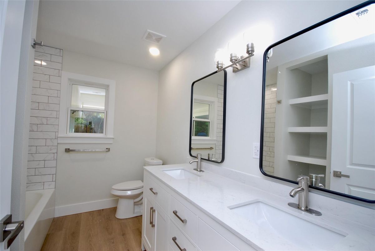 Bathroom, Dual Sink Vanities, Interior, Recessed Lighting, Wood Texture Flooring