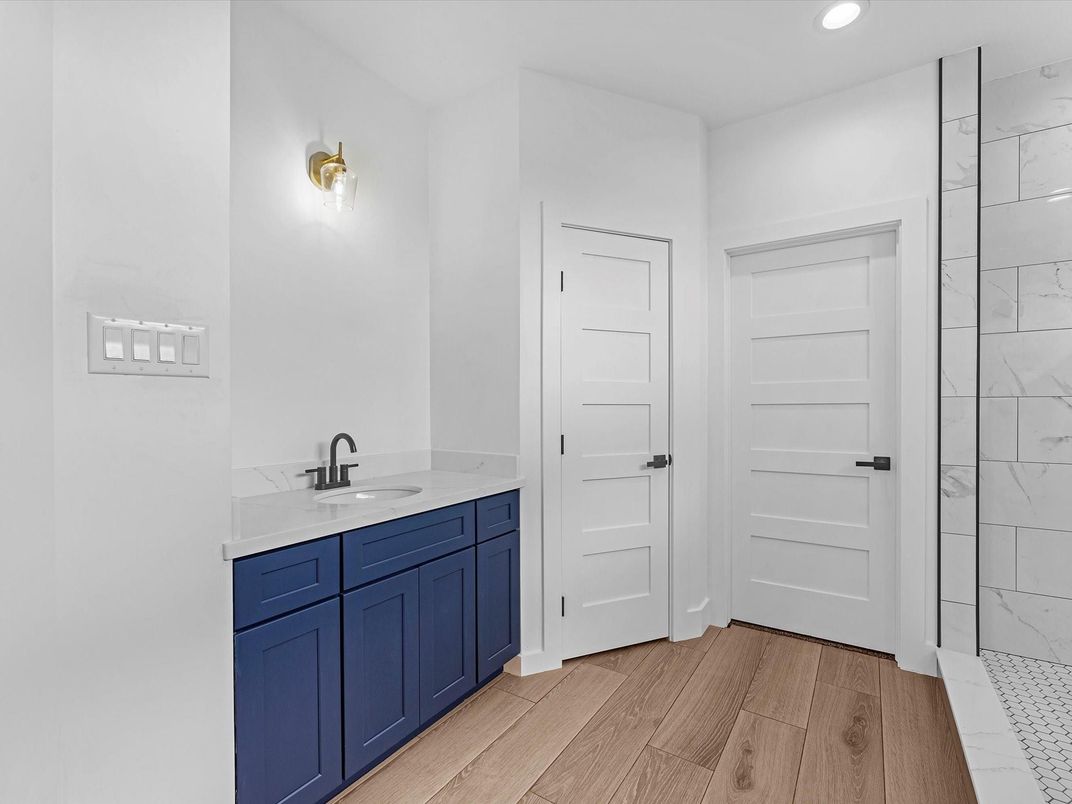 Bathroom, Interior, Marble Walls, Recessed Lighting, Wood Texture Flooring