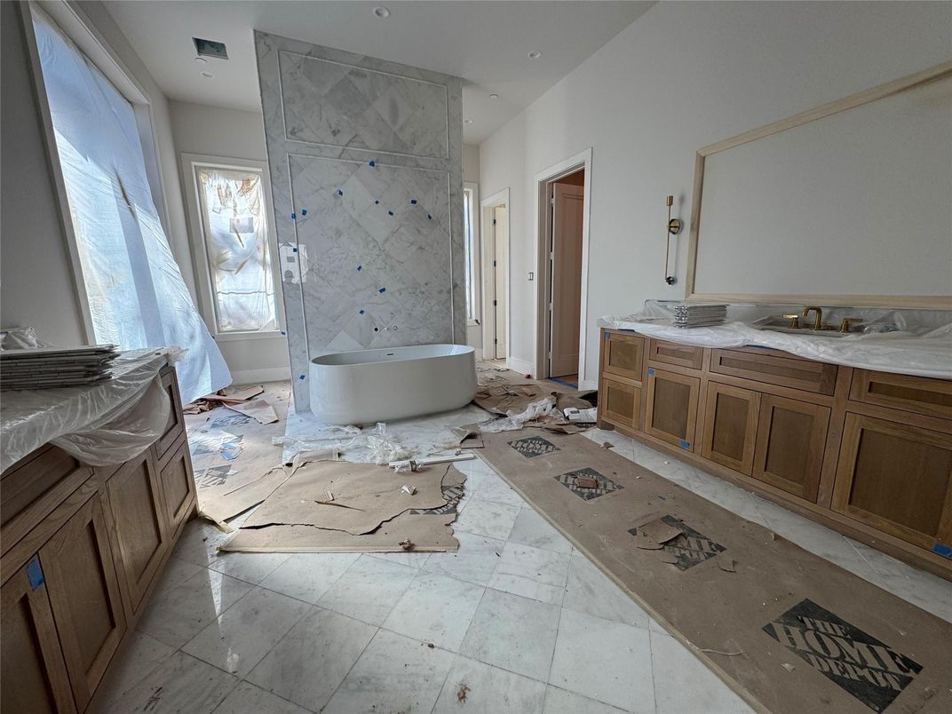 Bathroom, Dual Sink Vanities, Free Standing Baths, Glass Shower, Interior, Marble, Marble Walls, Recessed Lighting