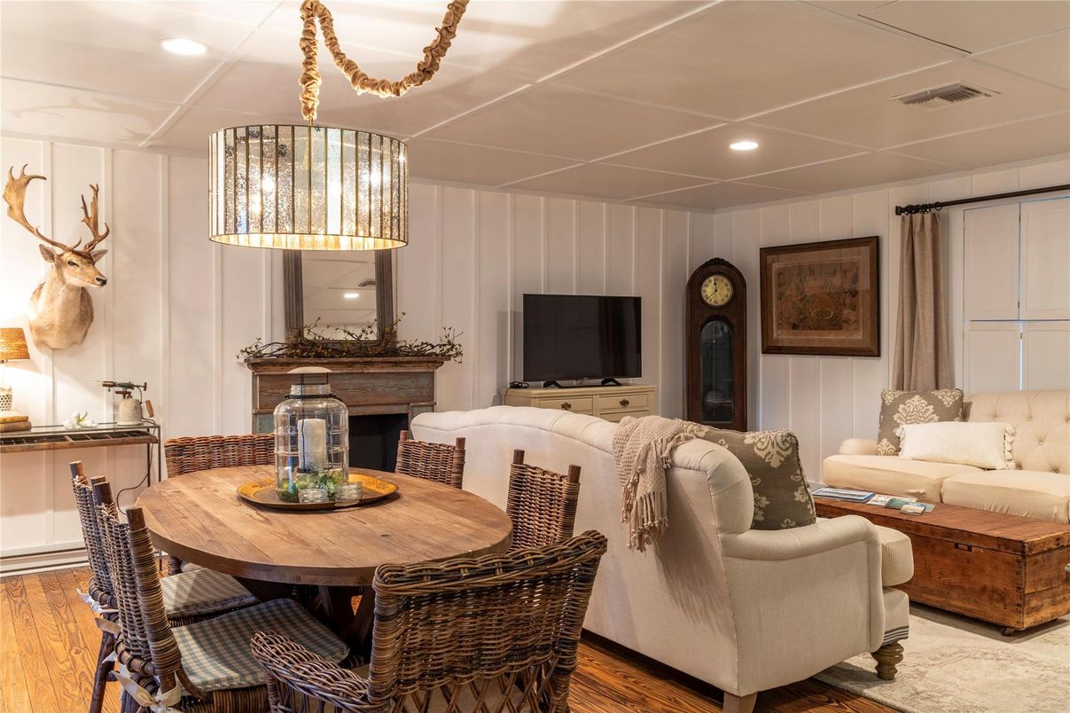 Dining room, Fireplace, Interior, Living room, Pendant Lights, Recessed Lighting, Wood Texture Flooring