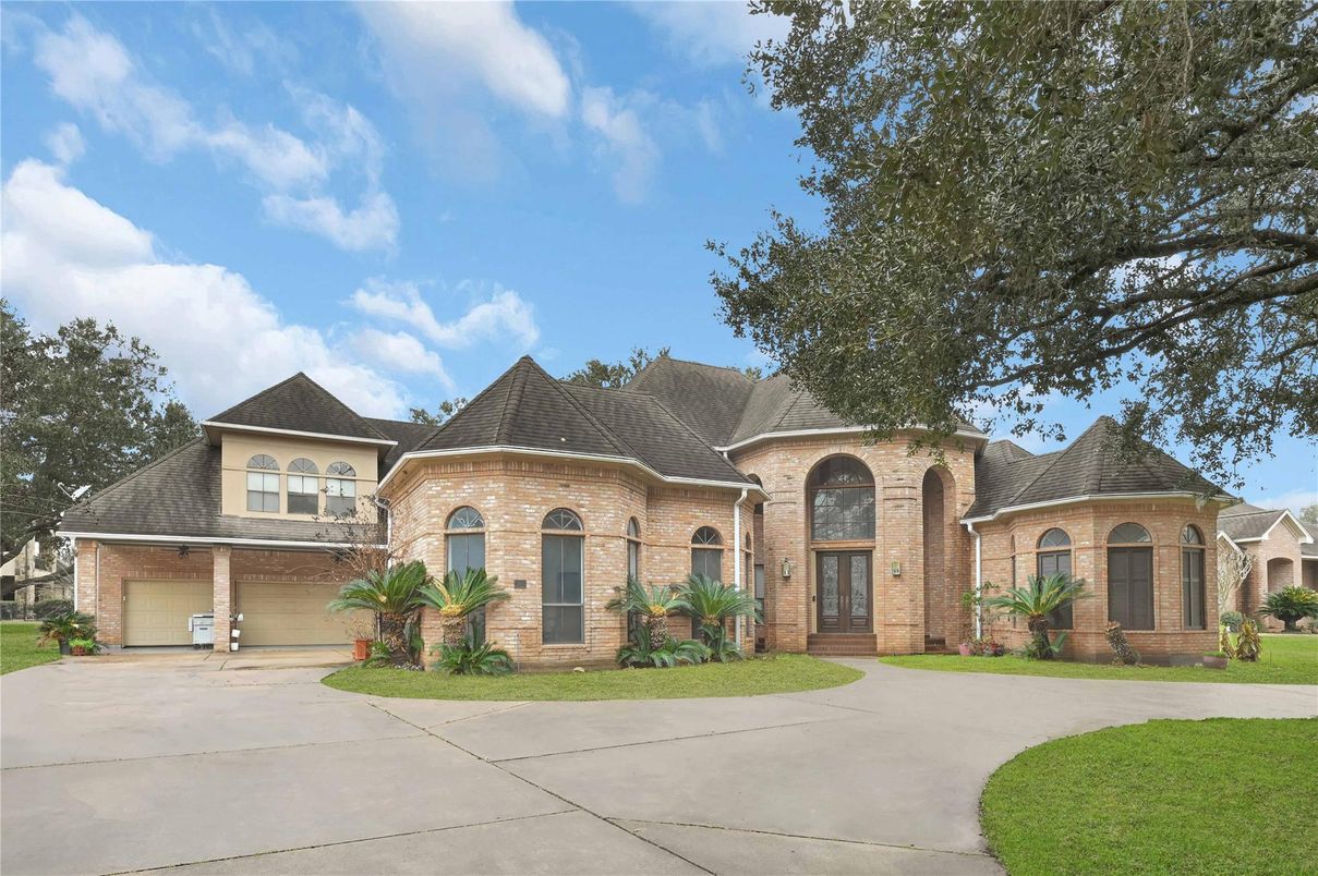 Attached, Exterior, Facade, Brick Facade, French Provincial