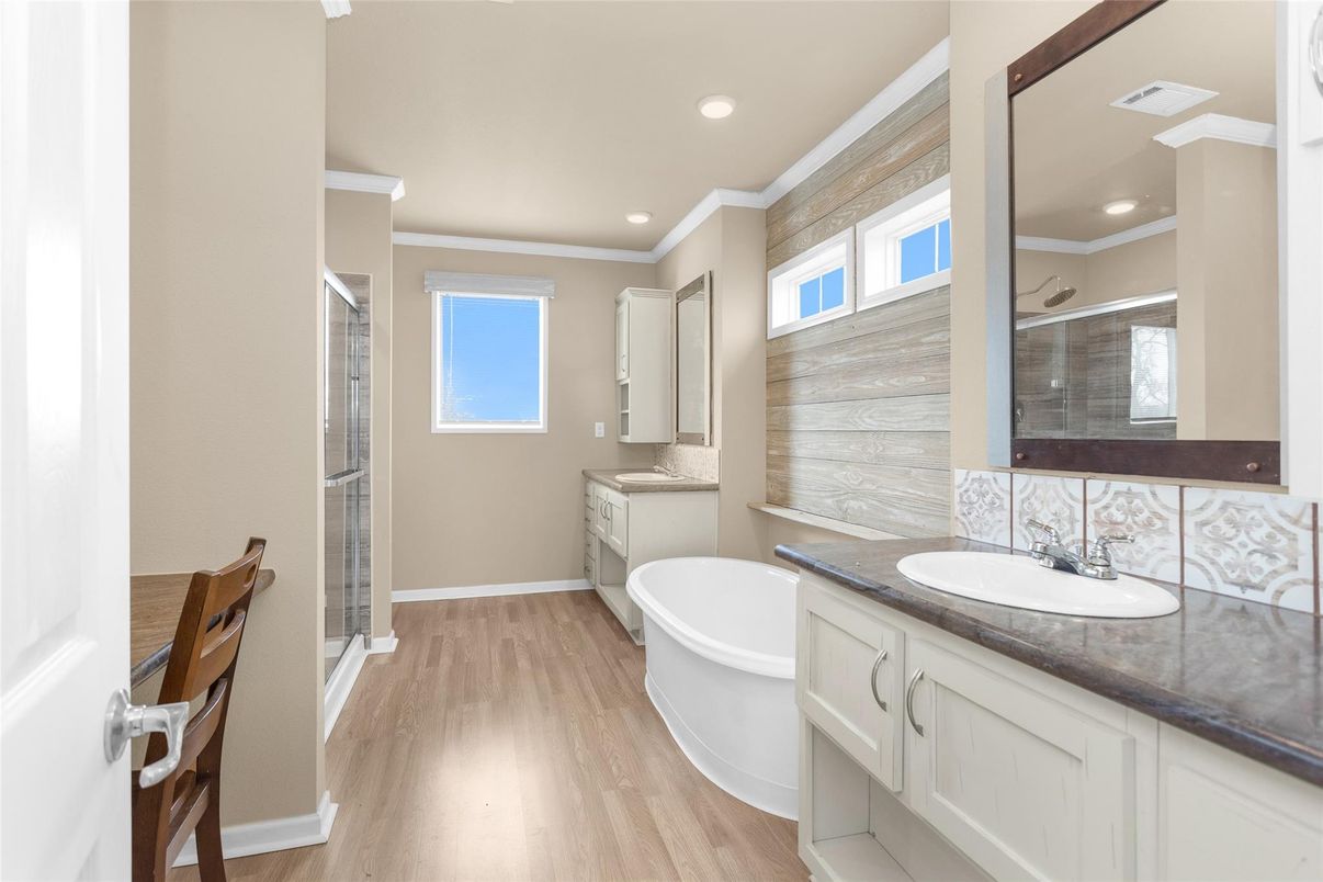 Bathroom, Dual Sink Vanities, Free Standing Baths, Interior, Recessed Lighting, Wood Texture Flooring