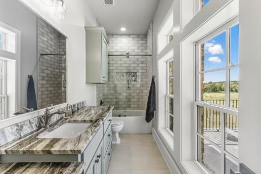 Bathroom, Dual Sink Vanities, Interior, Recessed Lighting, Stone Walls