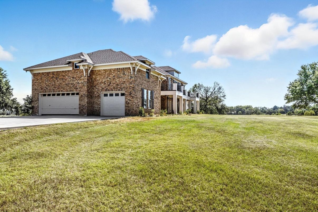 Attached, Backyard, Exterior, Facade, Brick Facade, Mediterranean