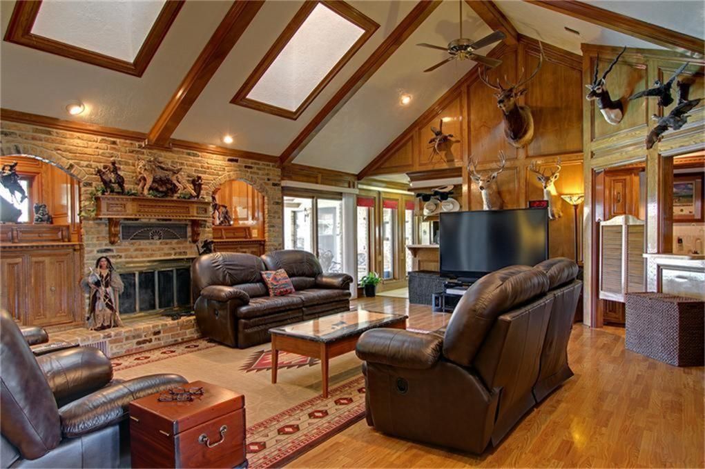 Fireplace, Interior, Living room, Recessed Lighting, Stone Walls, Wood Texture Flooring, Wooden Walls