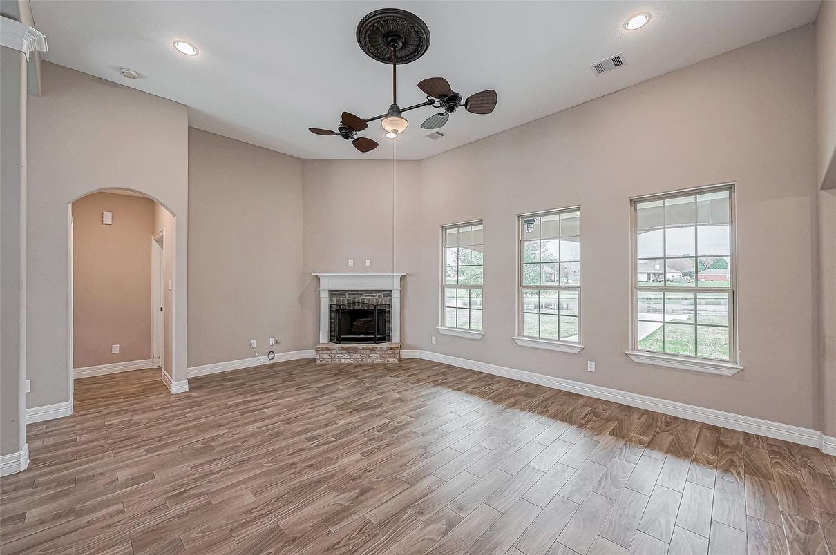Empty room, Fireplace, Interior, Recessed Lighting, Wood Texture Flooring