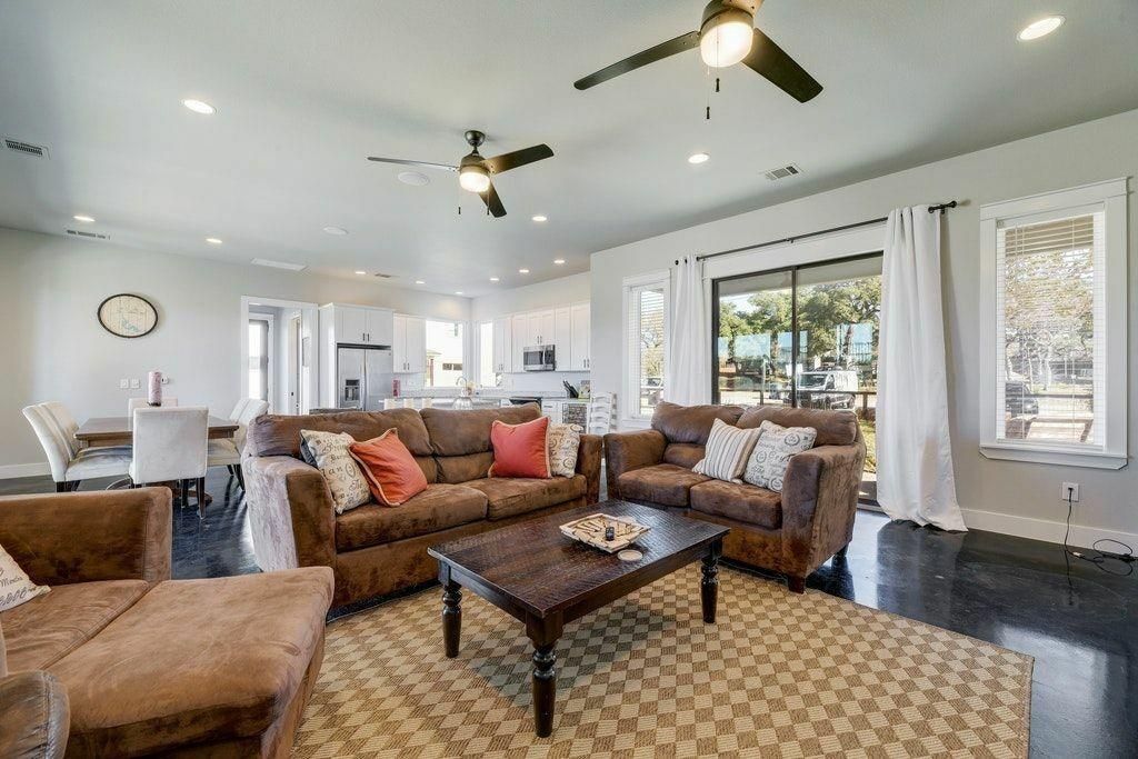 Dining room, Interior, Kitchen, Living room, Recessed Lighting, Stainless Steel Appliances, Wood Texture Flooring