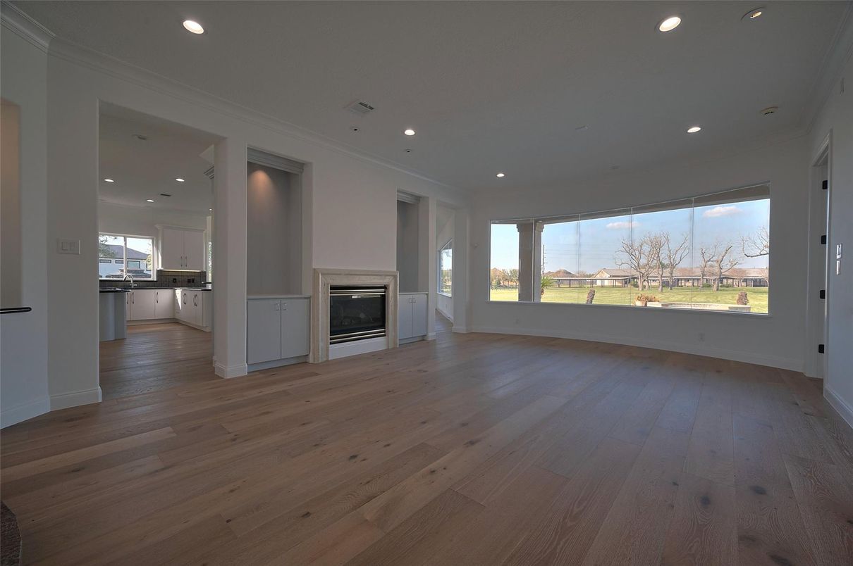 Empty room, Fireplace, Interior, Recessed Lighting, Wood Texture Flooring