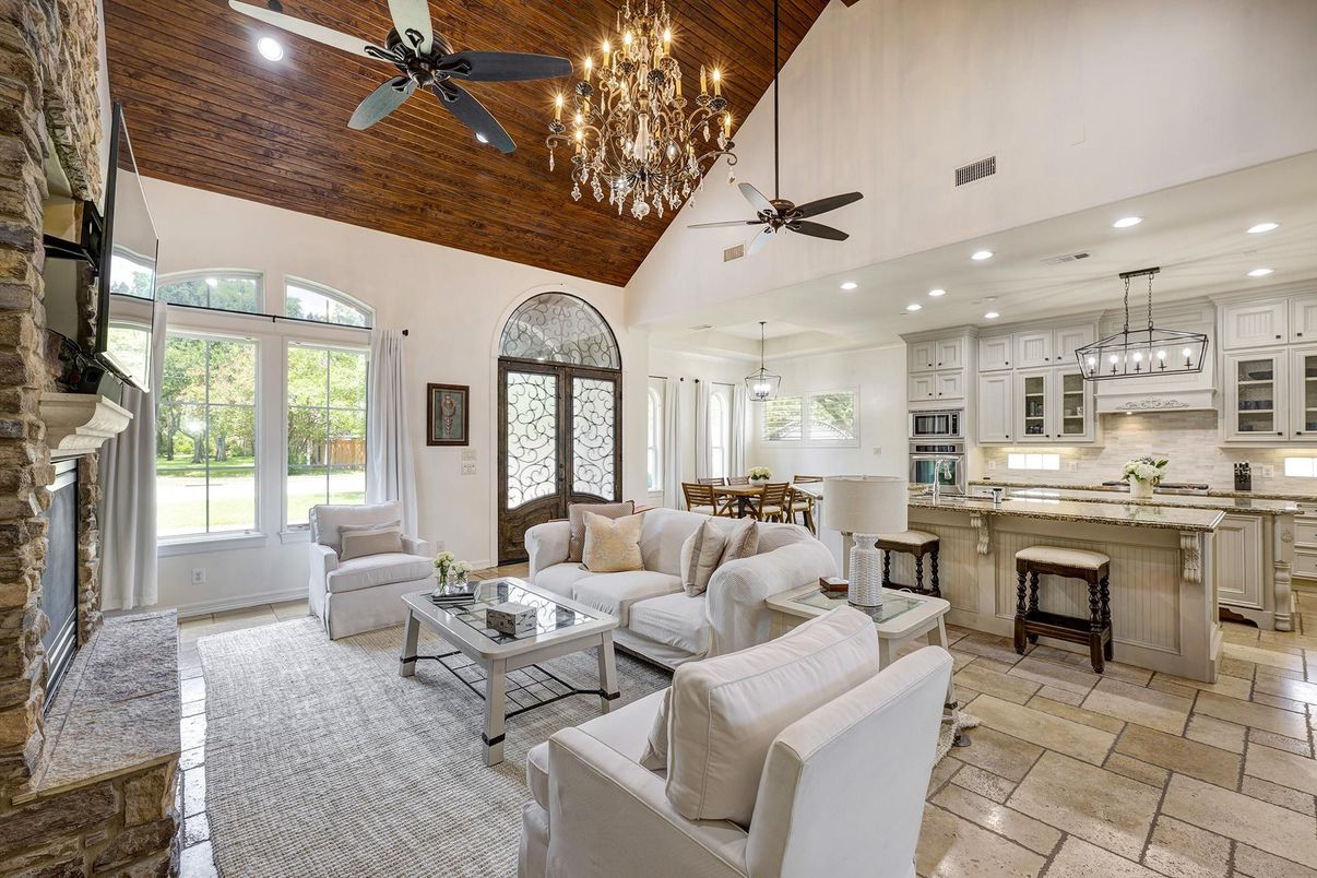 Chandelier, Dining room, Fireplace, Interior, Kitchen, Living room, Pendant Lights, Recessed Lighting, Stainless Steel Appliances, Wooden Beams, Wooden Ceilings