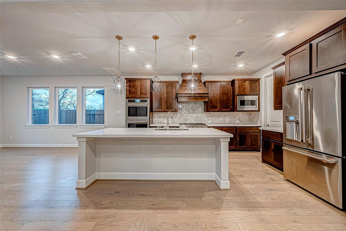 Interior, Kitchen, Pendant Lights, Recessed Lighting, Stainless Steel Appliances, Wood Texture Flooring