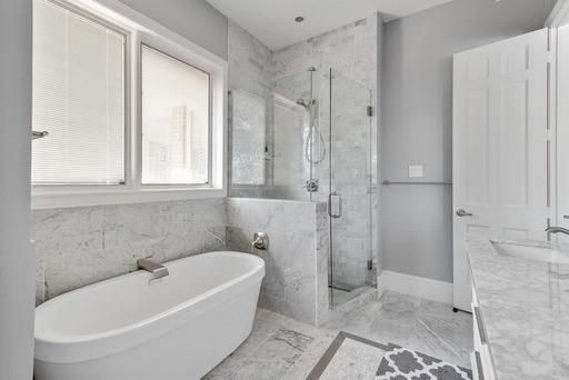 Bathroom, Free Standing Baths, Glass Shower, Interior, Marble, Marble Walls, Recessed Lighting