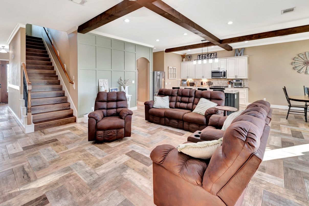 Dining room, Interior, Kitchen, Living room, Pendant Lights, Recessed Lighting, Stainless Steel Appliances, Wooden Beams, Wood Texture Flooring