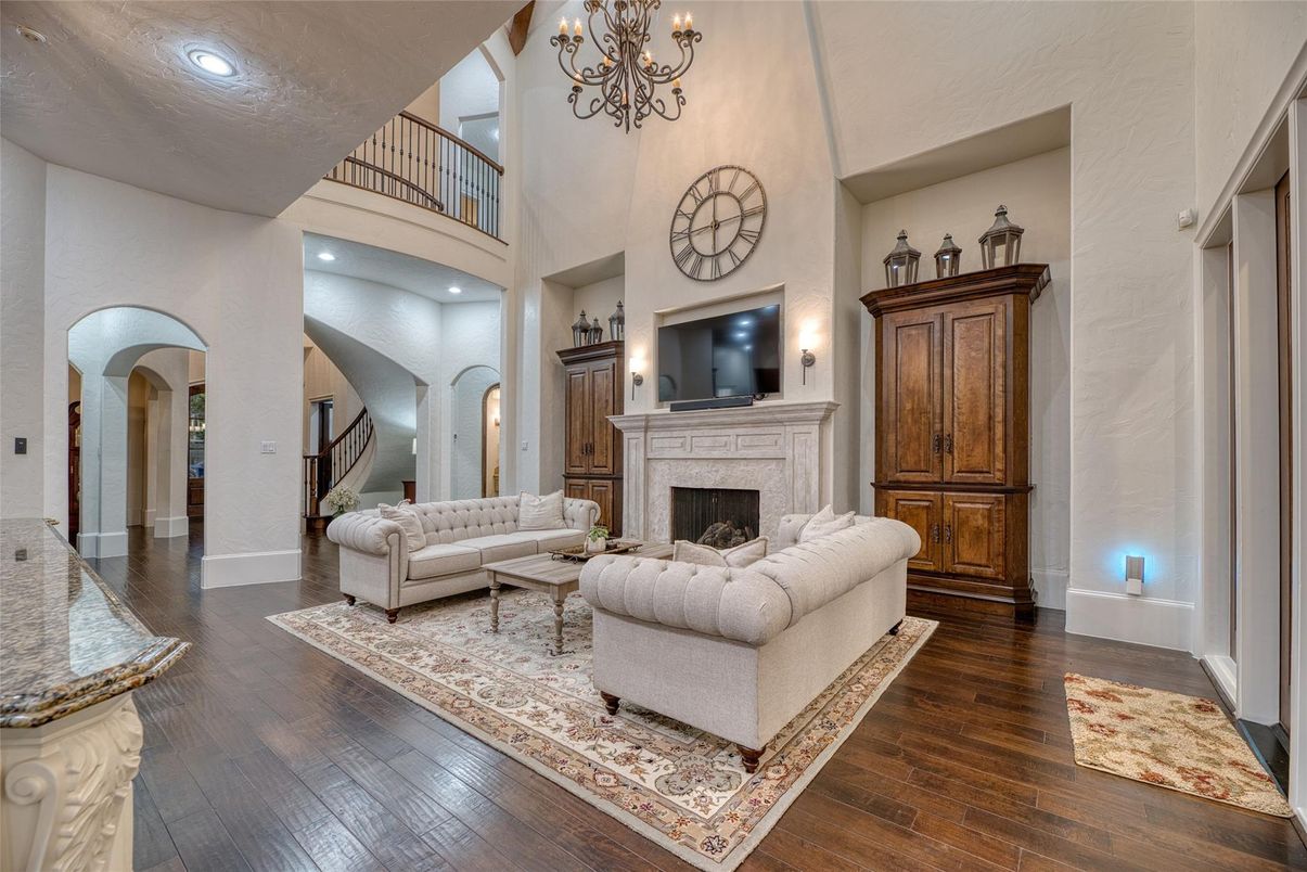 Chandelier, Fireplace, Interior, Living room, Recessed Lighting, Wood Texture Flooring