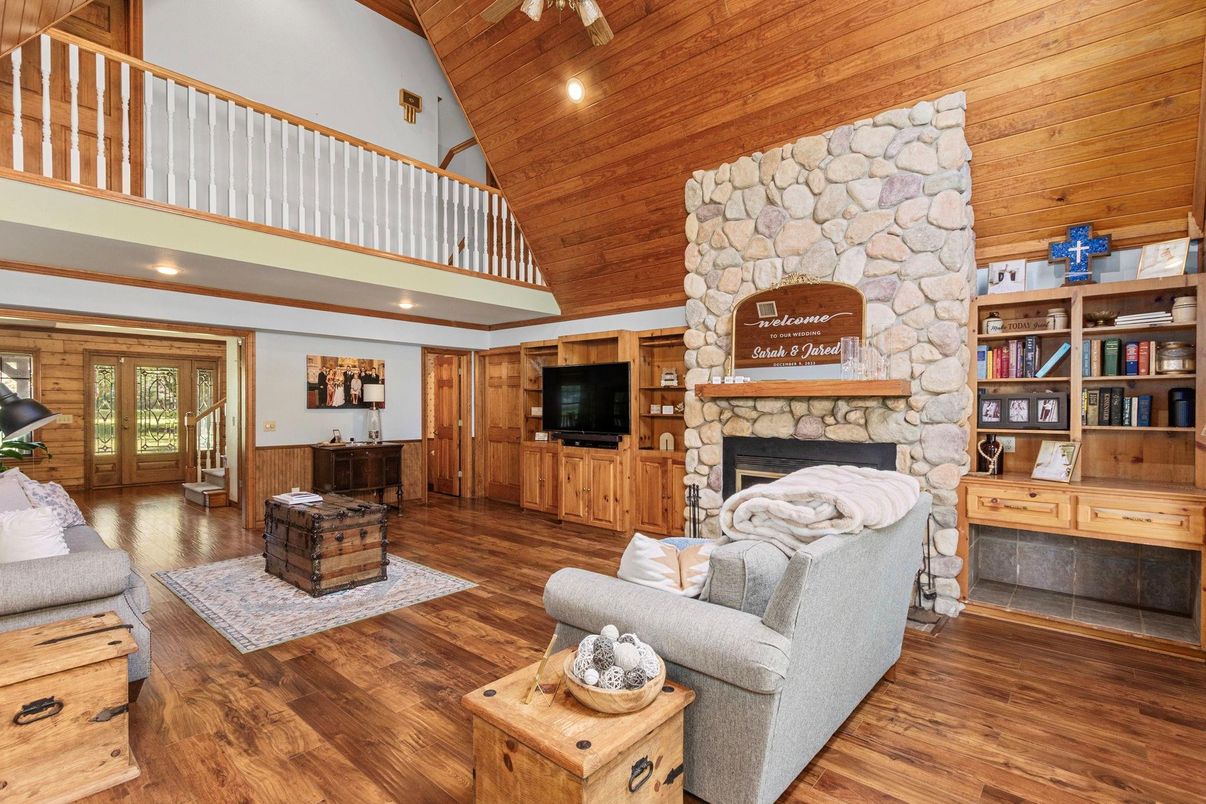 Fireplace, Interior, Living room, Recessed Lighting, Stone Walls, Wooden Ceilings, Wood Texture Flooring