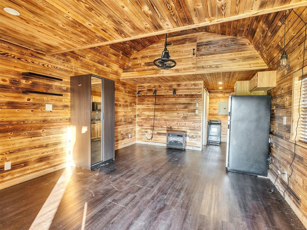 Empty room, Fireplace, Interior, Recessed Lighting, Wooden Ceilings, Wood Texture Flooring, Wooden Walls