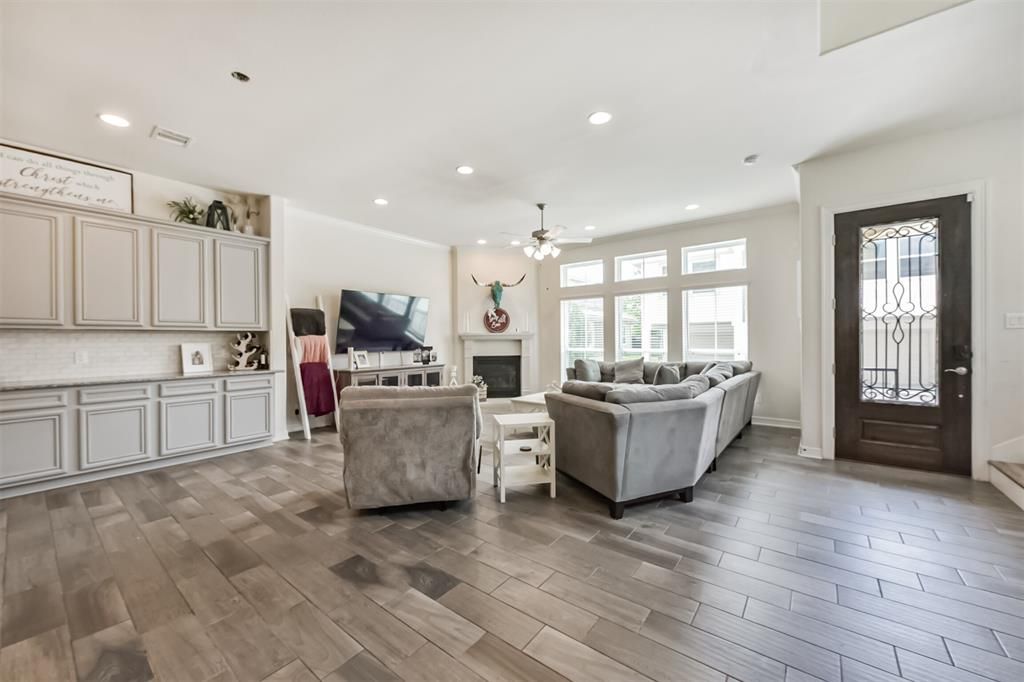 Fireplace, Interior, Living room, Recessed Lighting, Wood Texture Flooring