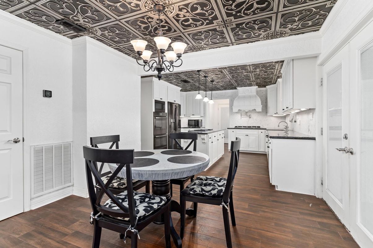 Chandelier, Dining room, Interior, Kitchen, Marble Walls, Stainless Steel Appliances, Wood Texture Flooring