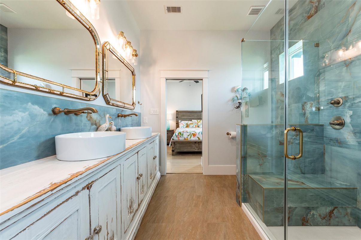 Bathroom, Bedroom, Dual Sink Vanities, Glass Shower, Interior, Tile Countertops, Wood Texture Flooring