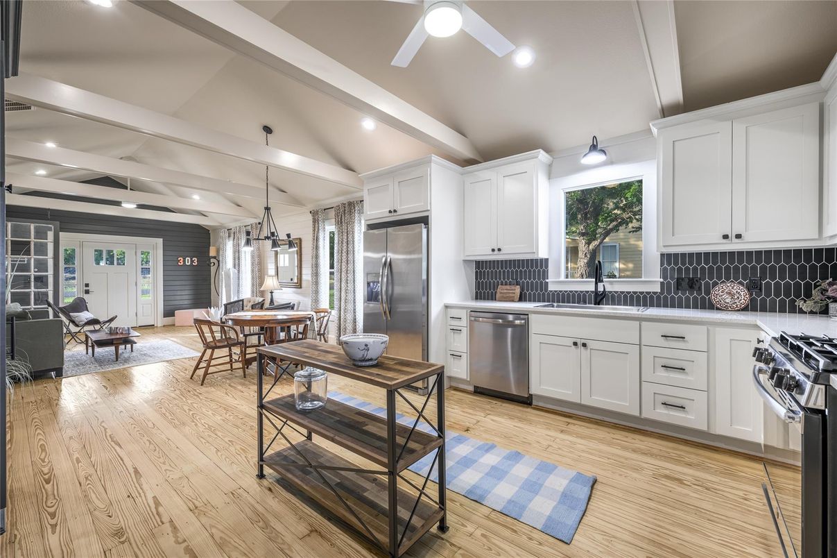 Dining room, Interior, Kitchen, Pendant Lights, Recessed Lighting, Stainless Steel Appliances, Wood Texture Flooring