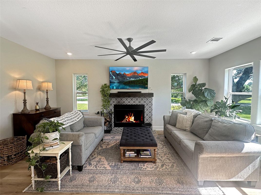 Fireplace, Interior, Living room, Recessed Lighting, Wood Texture Flooring