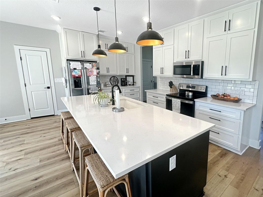 Interior, Kitchen, Pendant Lights, Recessed Lighting, Stainless Steel Appliances, Wood Texture Flooring