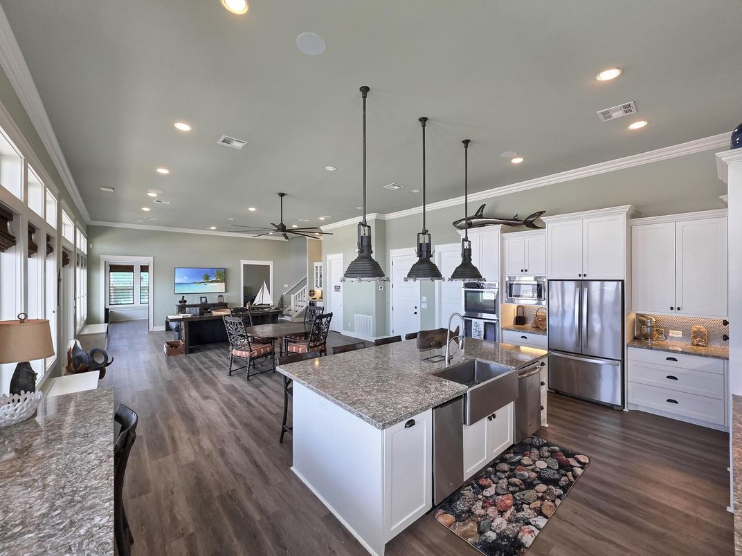 Dining room, Interior, Kitchen, Living room, Pendant Lights, Recessed Lighting, Stainless Steel Appliances, Wood Texture Flooring