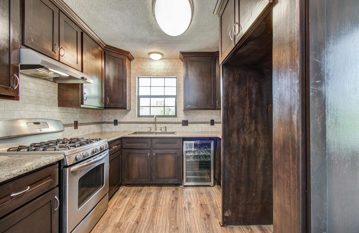 Interior, Kitchen, Stainless Steel Appliances, Stone Walls, Wood Texture Flooring