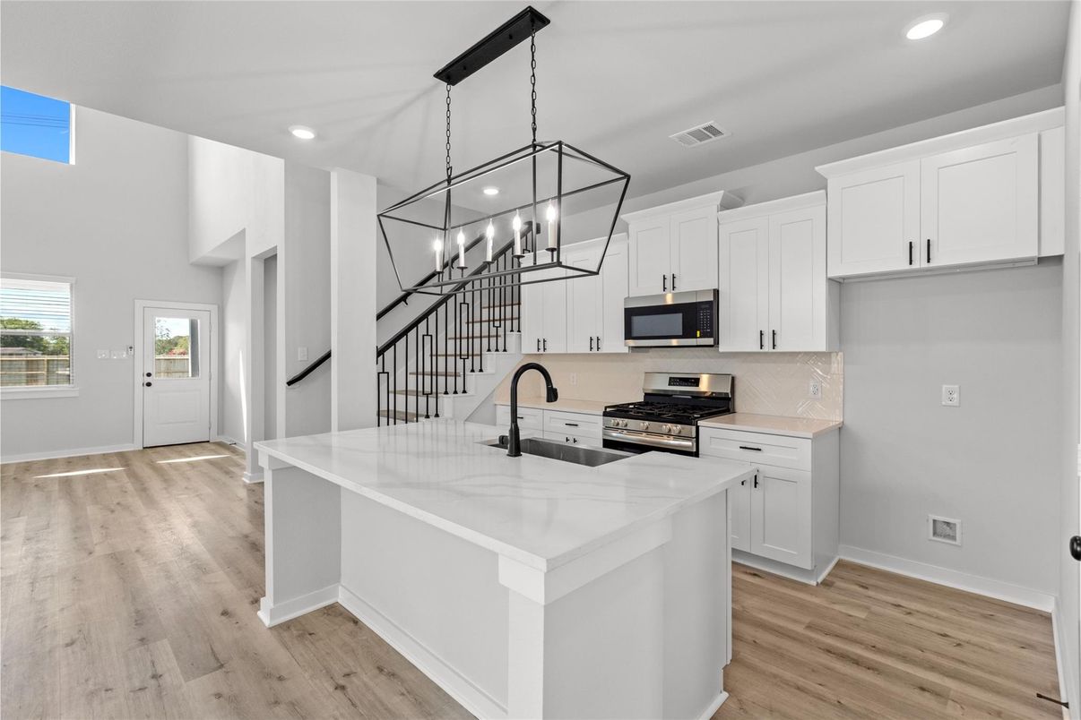 Interior, Kitchen, Pendant Lights, Recessed Lighting, Stainless Steel Appliances, Wood Texture Flooring