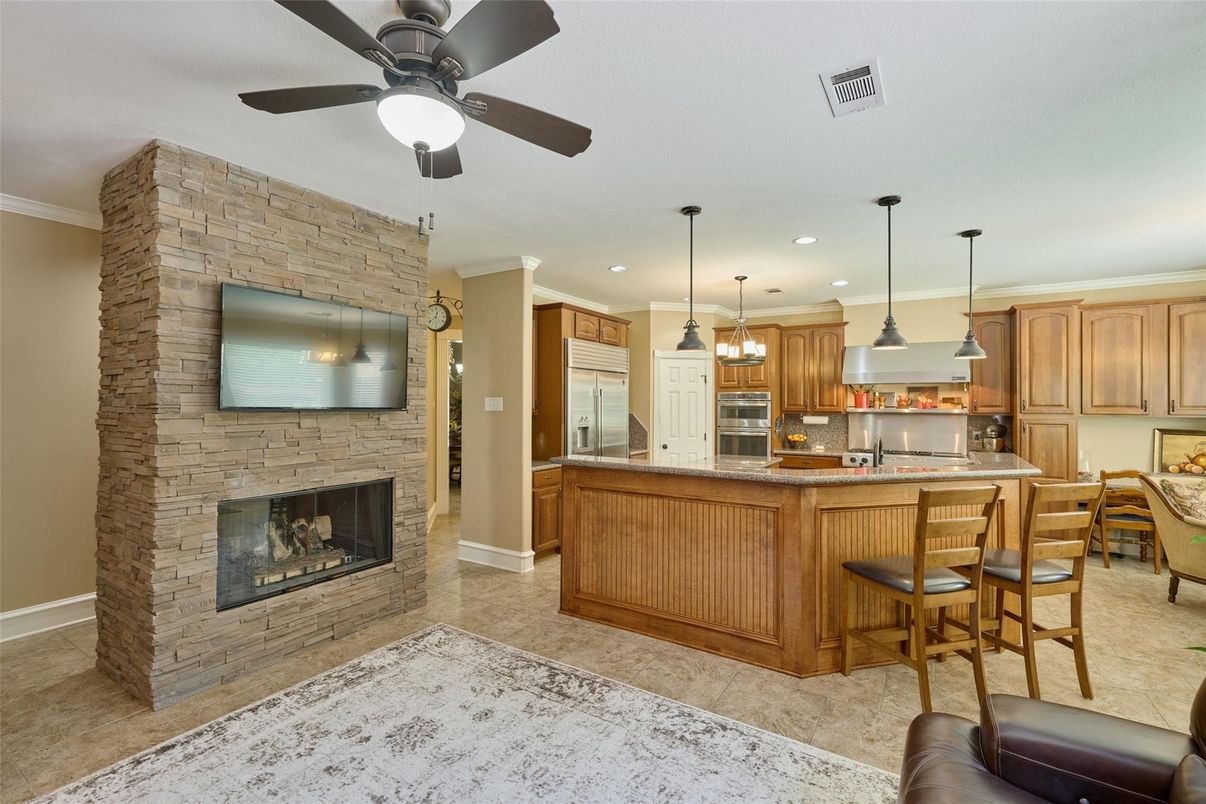 Fireplace, Interior, Kitchen, Pendant Lights, Recessed Lighting, Stone Walls